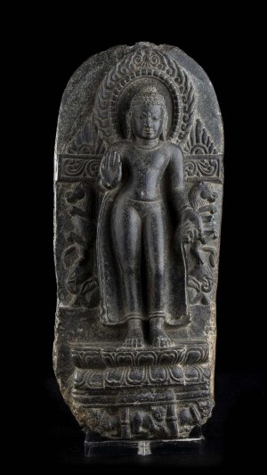 A STONE SCULPTURE WITH A STANDING BUDDHA India, Pala, 12th century