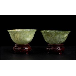 A PAIR OF GREEN STONE BOWLS WITH WOODEN BASE China, 20th century