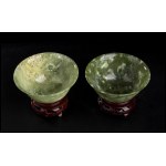 A PAIR OF GREEN STONE BOWLS WITH WOODEN BASE China, 20th century