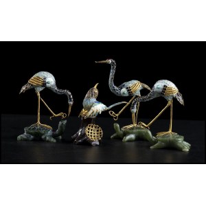 FOUR SMALL PARTIALLY GILT AND ENAMELLED METAL WITH HARDSTONE AND WOOD BASES SCULPTURES OF BIRDS China, 20th century
