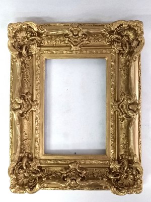 Richly decorated, gilded frame