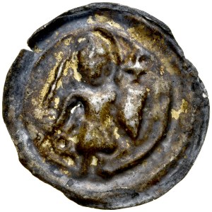 Brakteat guziczkowy II poł. XIII w., nieokreślona dzielnica, Av.: Stojacy św. Maurycy trzyma miecz i tarczę, w polu kółko i krzyżyk.