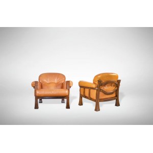 Set of two Vintage armchairs, Set of 2 Vintage Armchairs in wood and leather is an original design item realized by Italian Production, Italy in 1970s. Excellent condition.