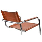 S34 Cognac Armchair, A midcentury chair realized in steel and aniline leather. 