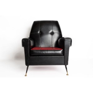 Vintage Armchair, Vintage armchair in black leather with legs realized in brass.