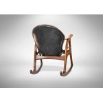 Danish Rocking chair, Very decorative vintage rocking chair made of teak wood wich contrasts with the leather of the seat. it has the tipical carateristics of scandinavian desing from the 1950s and 1960s.