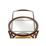 Vintage cart, Wood and brass bar trolley with glass shelves. The glass base features a lithograph.