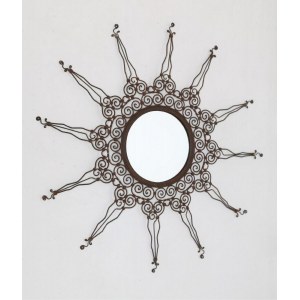 Wall Mirror, Mirror with frame and decorative element in crystal and ironMirror made with decorative elements in crystal and iron in the shape of a sun. Italian manufacture from the 70s.