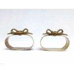 A pair of decorative napkin rings
