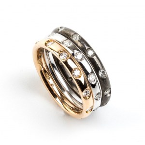 POMELLATO, collection Lucciole: titanium gold diamond rings