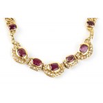 Ruby diamond gold necklace, bracelet and a pair of earrings