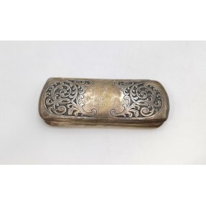 Eyeglass case with rhytic floral decoration