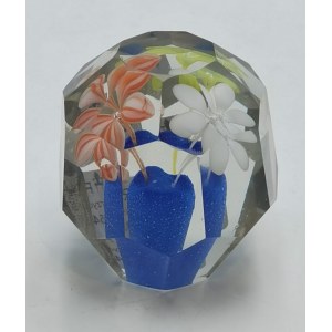 Paperweight with a bouquet of flowers in a vase