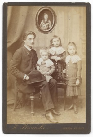 [PORTRAIT PHOTOGRAPH - father with children - shot in cabinet format]. [not before 1891, not after 1893]....