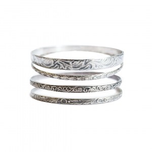 Set of four silver bracelets