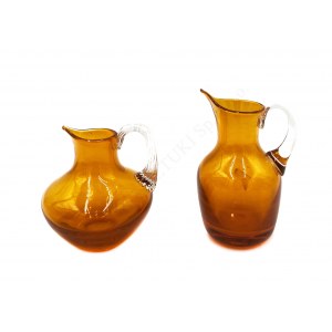 Two glass pitchers,