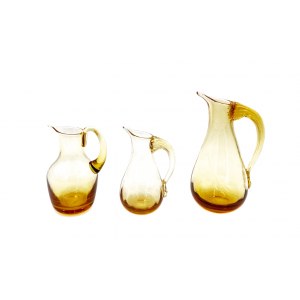 Three glass pitchers,