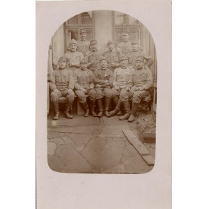 Group of officers and soldiers in front of the building, circa 1915.