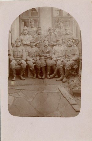 Group of officers and soldiers in front of the building, circa 1915.