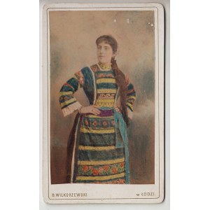 Woman in folk costume, Lodz, photo by Wilkoszewski.