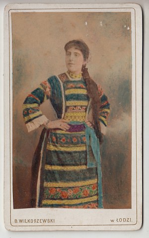 Woman in folk costume, Lodz, photo by Wilkoszewski.