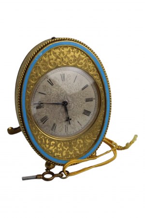Gilt travel watch with blue bezel France 19th century.