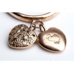 POMELLATO, Dodo collection: Rose gold ring with two hearts' pendant with diamonds