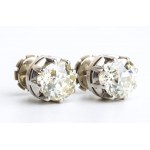 Diamond platinum ring convertible in a pair of earrings