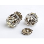 Diamond platinum ring convertible in a pair of earrings