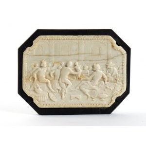 Carved ivory plaque depicting a banquet