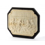 Carved ivory plaque depicting a banquet