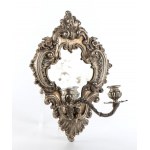 A pair of silver wall sconces