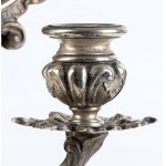 A pair of silver wall sconces