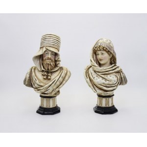 A pair of busts - a man and a woman