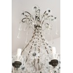 Antique crystal and tin chandelier dating back to the first half of the 20th century.