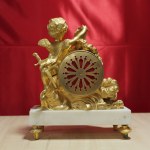 A gilded mercury bronze clock