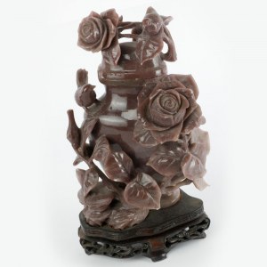 Potiches in stone material with floral and animal decoration