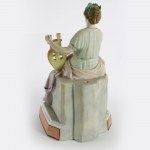 Harp player, volume sculpture in polychrome porcelain