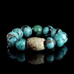 A TURQUOISE AND JADE BRACELET