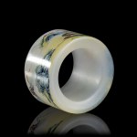 A PAINTED GLASS ARCHER RING