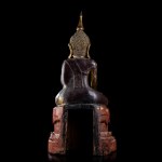 A LACQUERED AND GILT WOOD LARGE BUDDHA