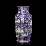 A POLYCHROME ENAMELLED PORCELAIN VASE