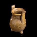 A MARBLED GLAZED CERAMIC TRIPOD VASE