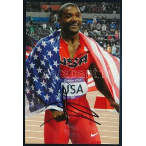 Justin Gatlin (1982- ) amerikai atléta, rövidtávufó, olimpiai- és világbajnok autográf aláírása őt ábrázoló fotón...