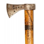 Axe cunt with metal badges of trails climbed, early 20th century.