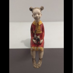 IDA - a girl with a cat.