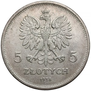 Nike 5 zlatá 1928 s nápisem, Varšava