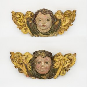 A pair of angel heads