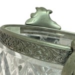 Glass vase crafted and finished with a silver-plated metal rim at the top