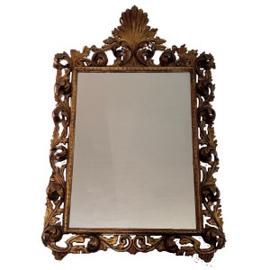 Carved and gilded wooden mirror with floral motif